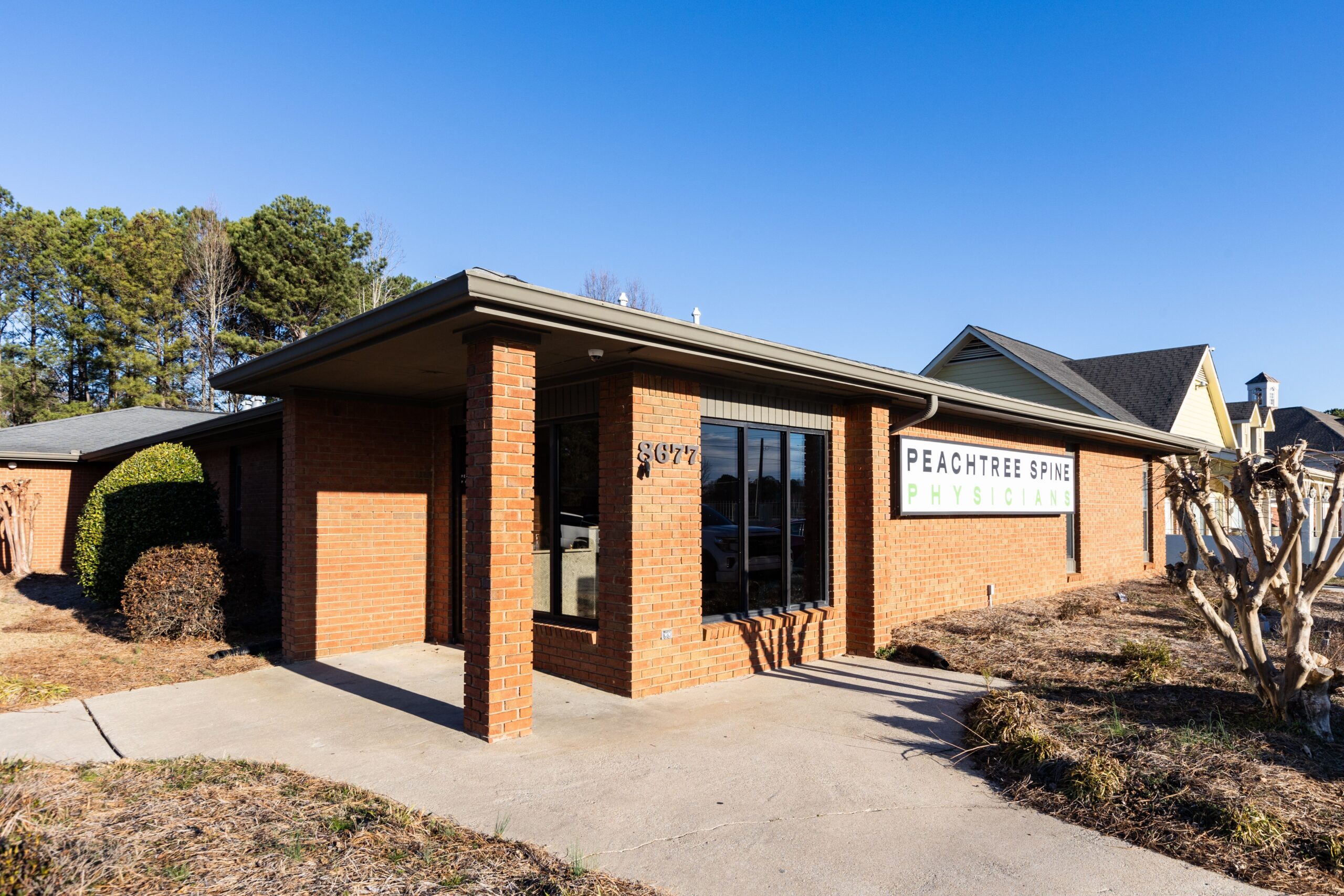Peachtree Spine & Sports Physicians Douglasville office exterior at 8677 Hospital Drive