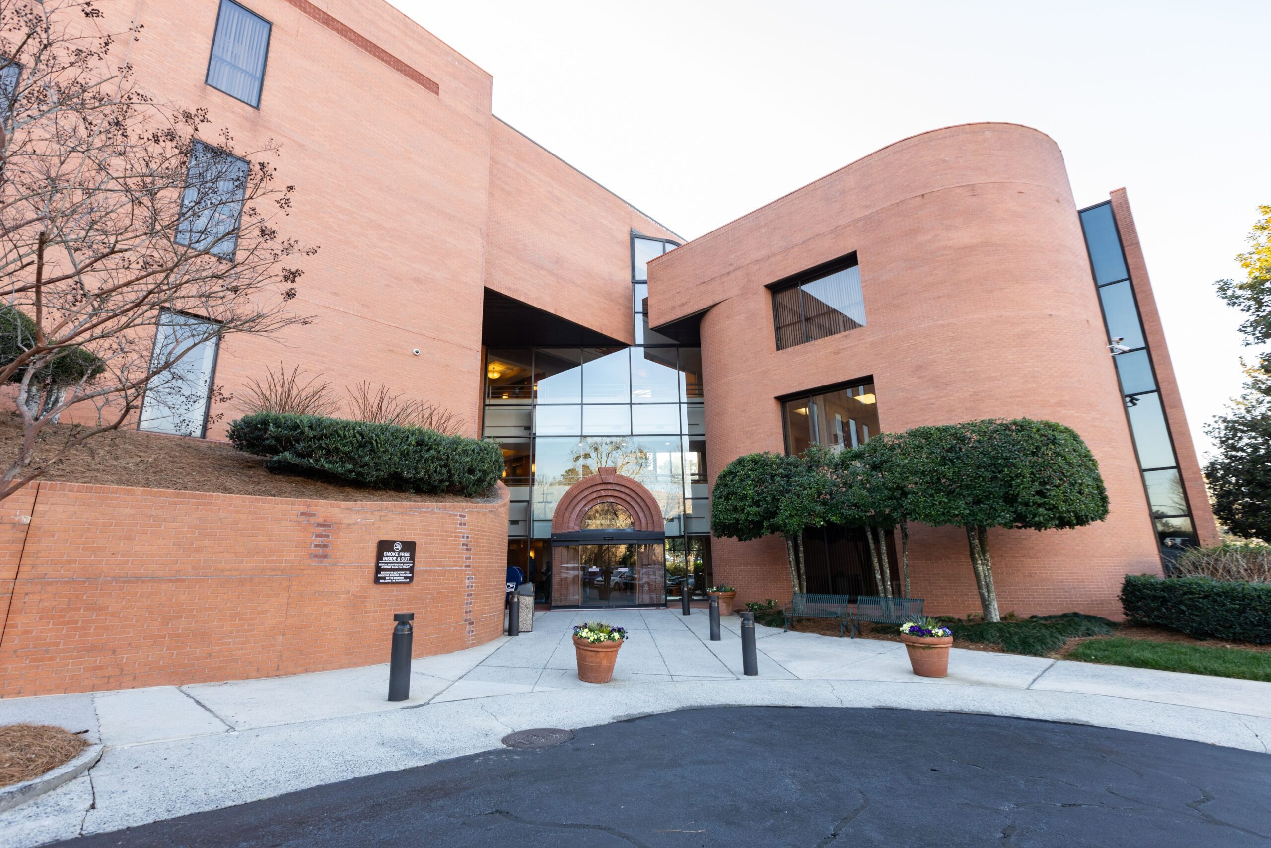 Peachtree Spine & Sports Physicians Atlanta office exterior at 5555 Peachtree Dunwoody Rd NE