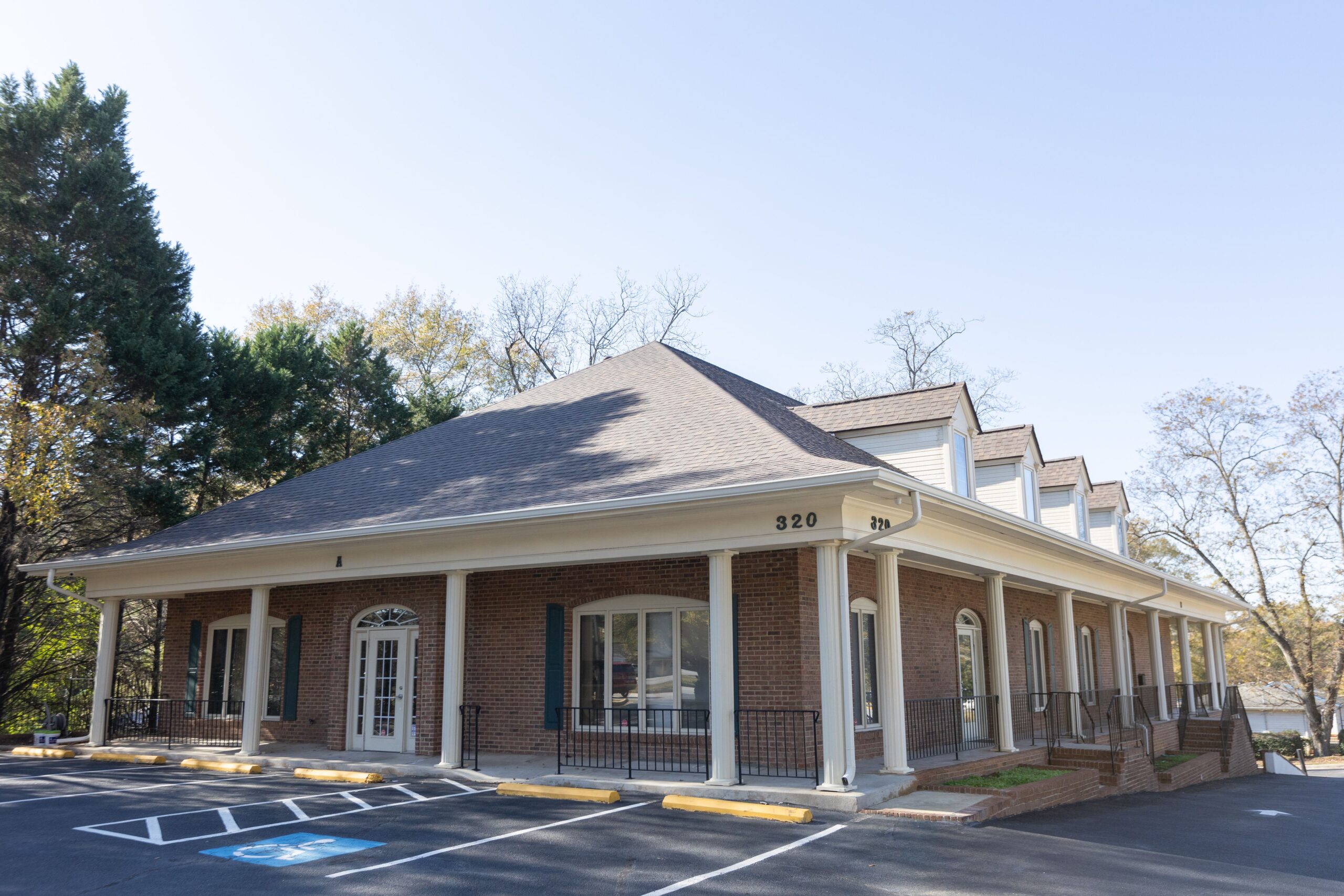 Peachtree Spine & Sports Physicians Fayetteville office exterior at 320 N. Jeff Davis Dr